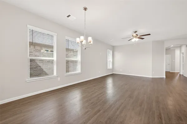 a kitchen with granite countertop a sink and a stove