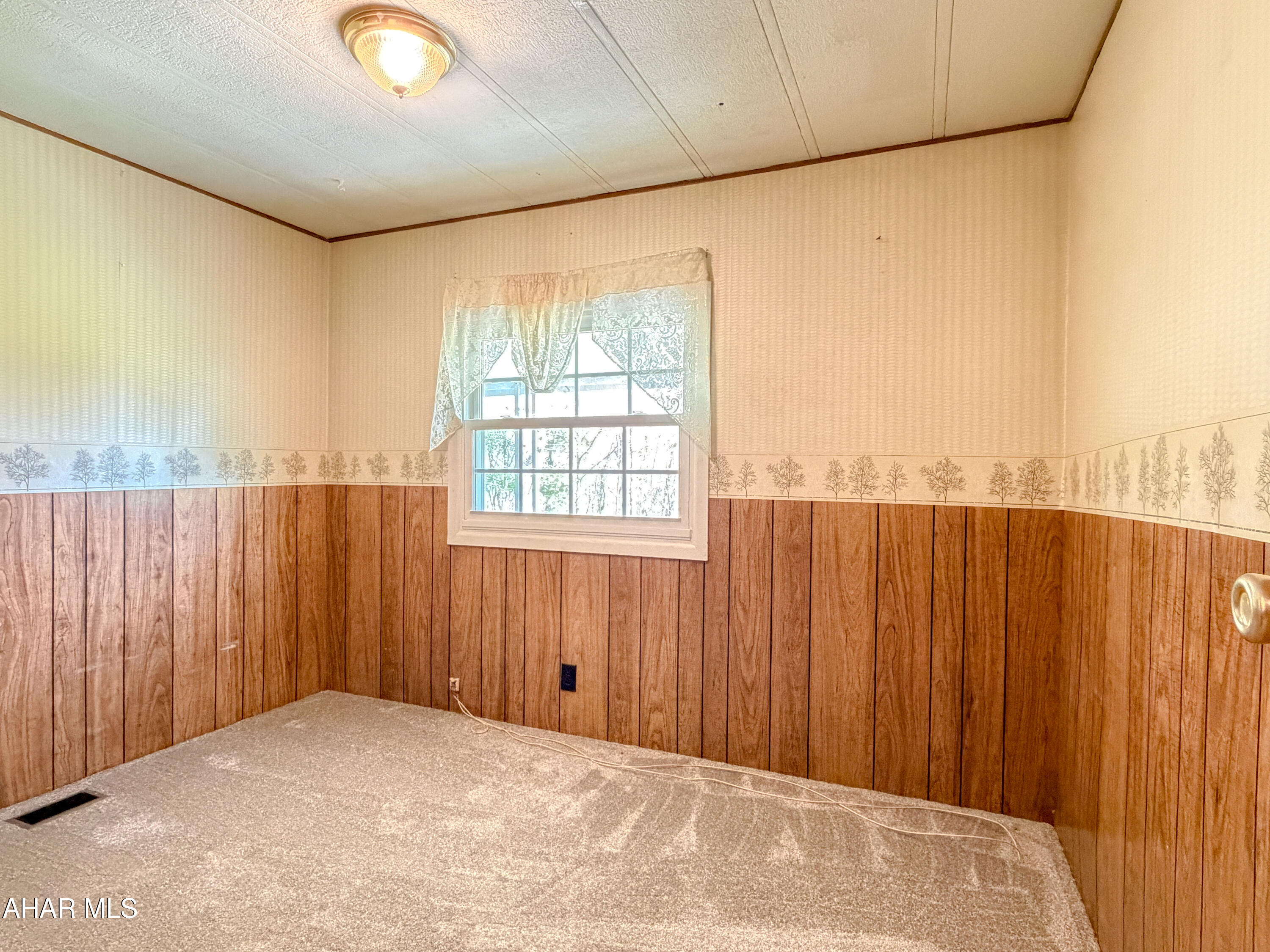 151 Pine Echo Road Everett, PA 15537 - Photo 30 of 51 a view of a room with a large window
