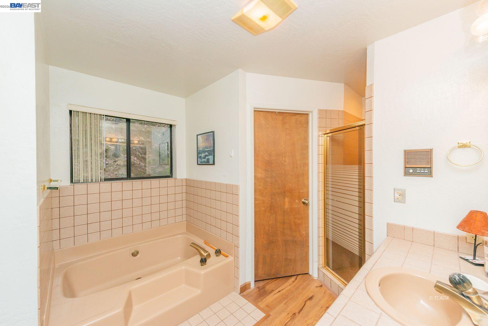 2393 Poker Bar Road Douglas City, CA 96024 - Photo 19 of 52 a bathroom with a bathtub and shower