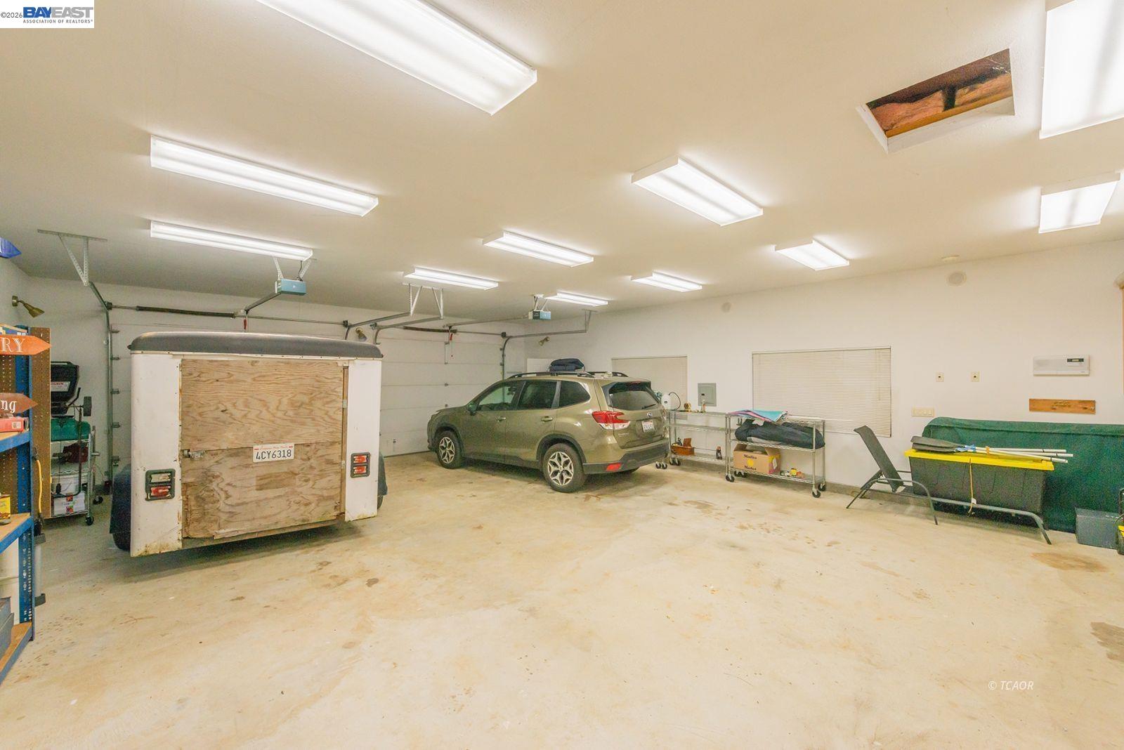 2393 Poker Bar Road Douglas City, CA 96024 - Photo 42 of 52 a view of a garage with parked cars