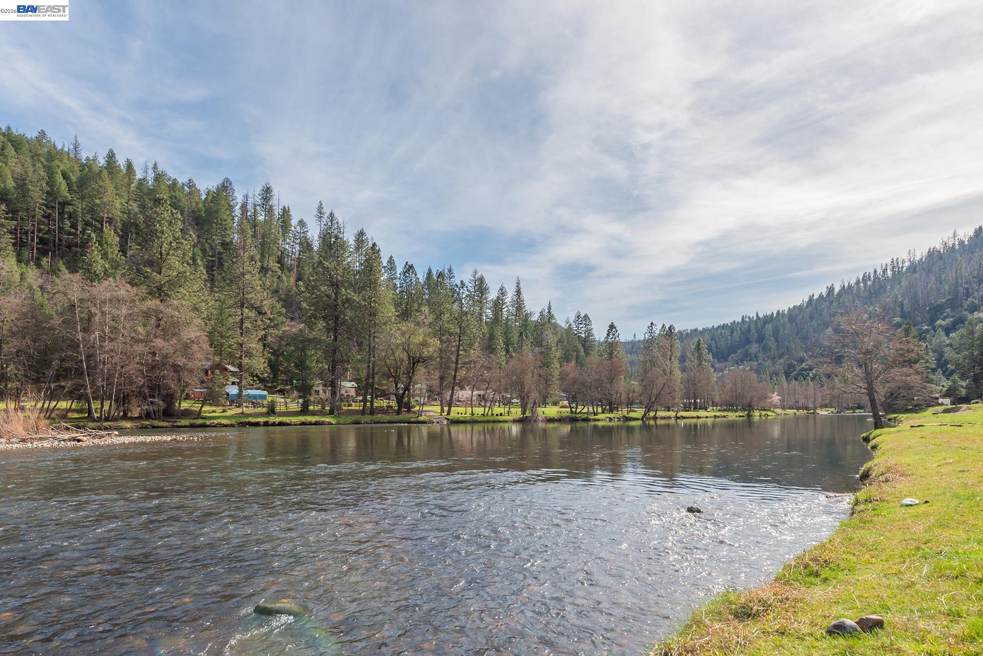 2393 Poker Bar Road Douglas City, CA 96024 - Photo 48 of 52 a view of a lake with houses in the background