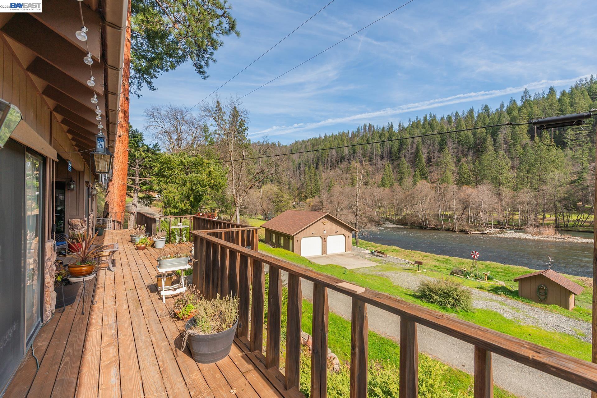 2393 Poker Bar Road Douglas City, CA 96024 - Photo 6 of 52 a view of a balcony with wooden floor and fence