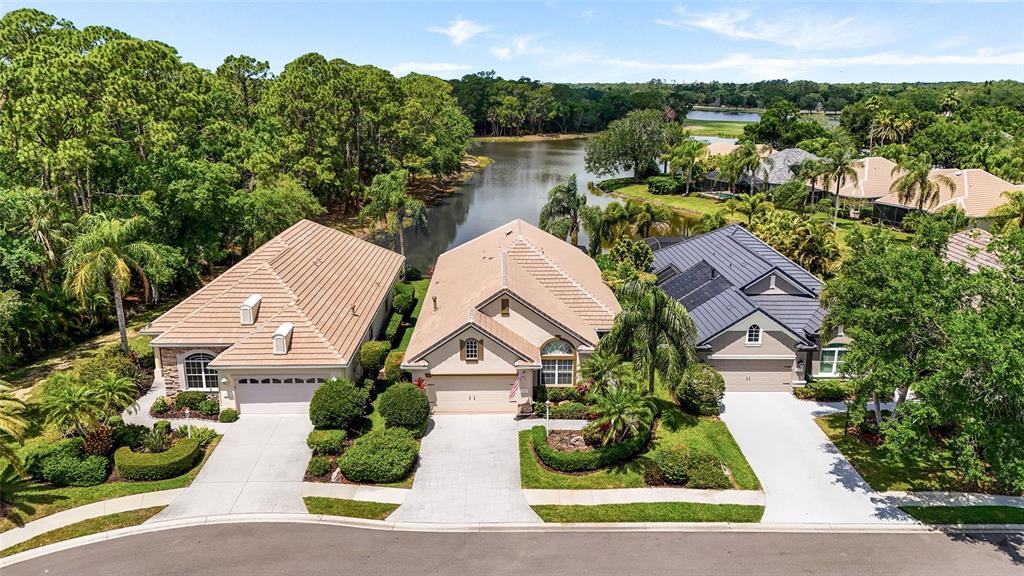 7822 Troon Court Lakewood Ranch, FL 34202 - Photo 55 of 83 an aerial view of house with yard