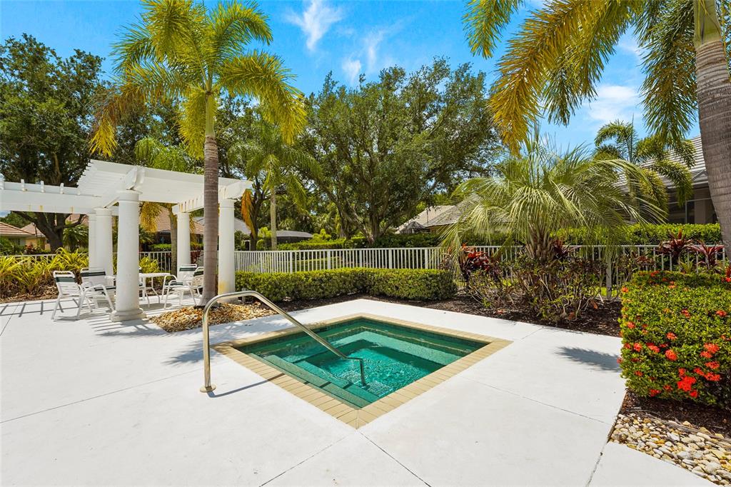 7822 Troon Court Lakewood Ranch, FL 34202 - Photo 70 of 83 a view of a chairs and tables in the patio
