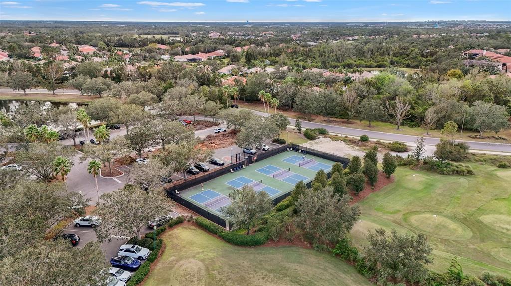 7822 Troon Court Lakewood Ranch, FL 34202 - Photo 78 of 83 an aerial view of a house with a yard
