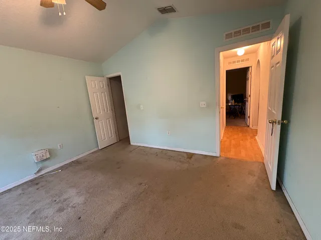 a view of a room with an empty space