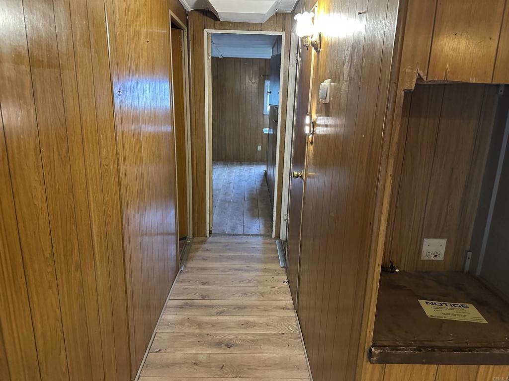 8301 Mission Gorge Road, Unit 274 Santee, CA 92071 - Photo 11 of 41 a view of a hallway with wooden floor