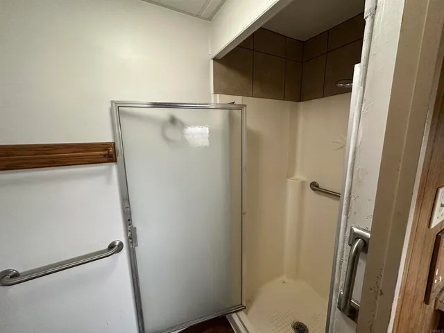 a room with table and mirror