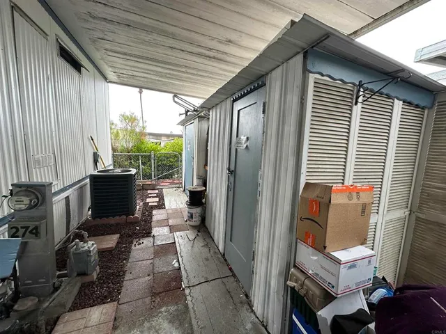 a view of a balcony with wooden floor