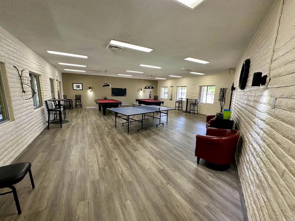 8301 Mission Gorge Road, Unit 274 Santee, CA 92071 - Photo 26 of 41 a living room with furniture and a wooden floor