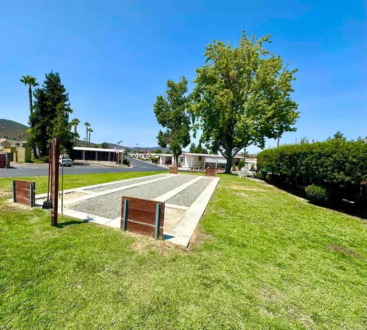 a patio with table and chairs