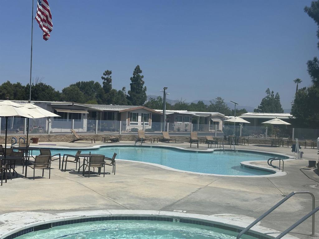 8301 Mission Gorge Road, Unit 274 Santee, CA 92071 - Photo 35 of 41 a view of house with swimming pool outdoor seating