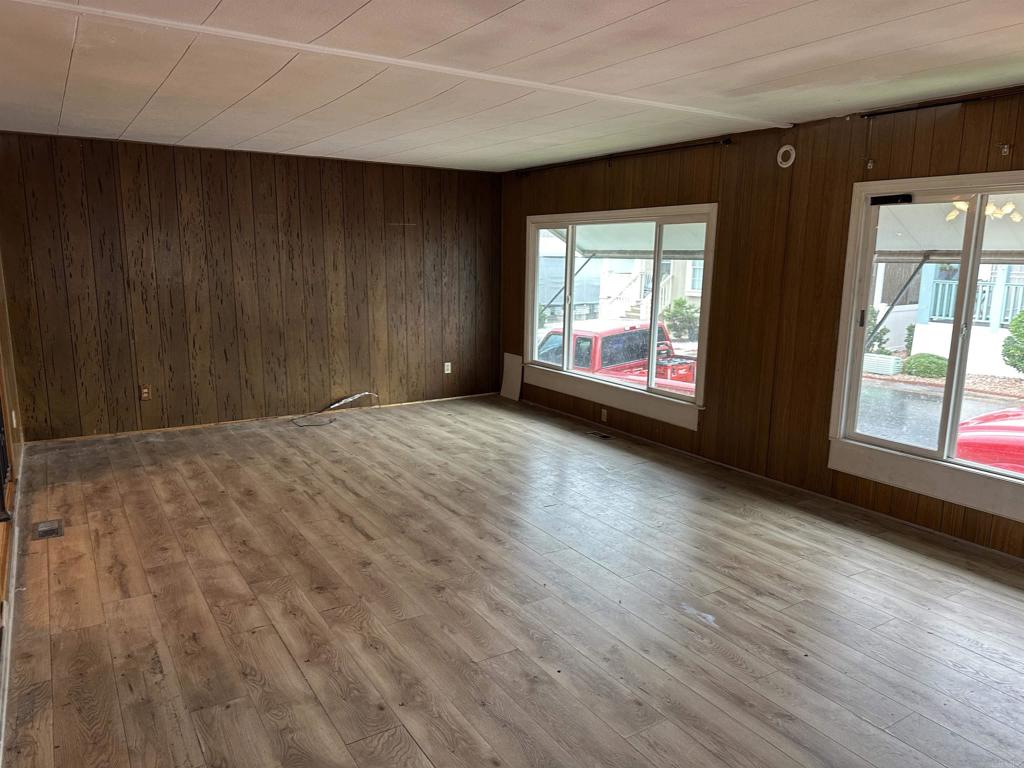 8301 Mission Gorge Road, Unit 274 Santee, CA 92071 - Photo 4 of 41 a view of a room with wooden floor and windows