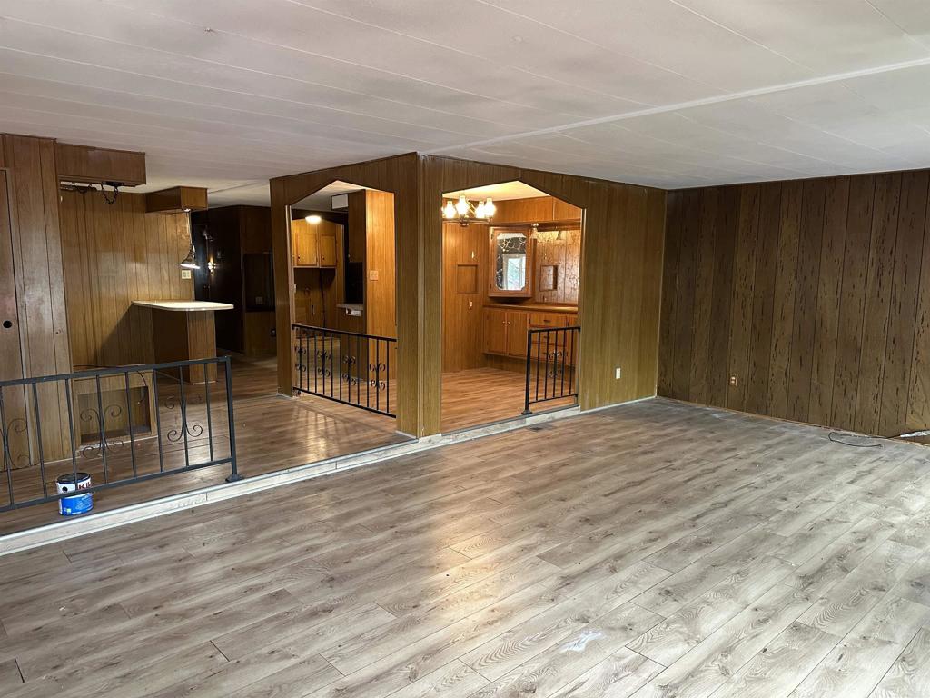 8301 Mission Gorge Road, Unit 274 Santee, CA 92071 - Photo 5 of 41 a view of empty room with wooden floor and fan