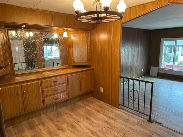 a bathroom with a mirror and a shower