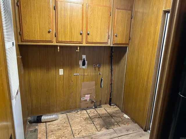 a bathroom with a tub and shower