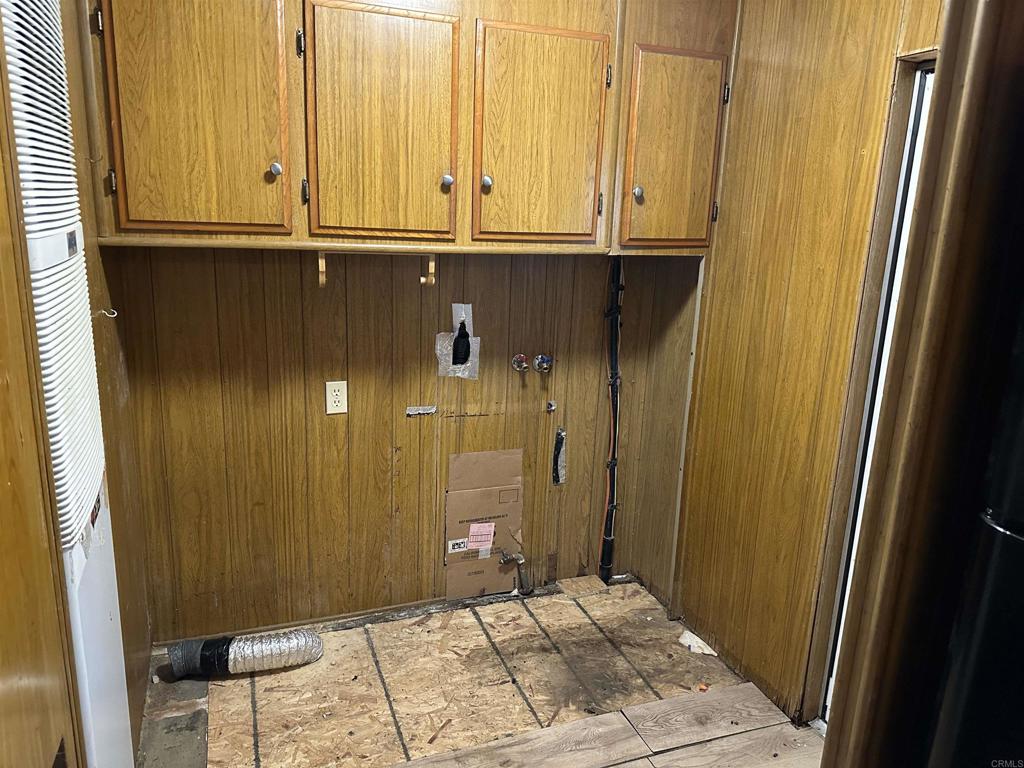 8301 Mission Gorge Road, Unit 274 Santee, CA 92071 - Photo 9 of 41 a bathroom with a granite countertop sink and a mirror