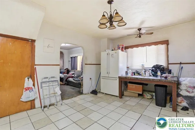 a view of storage and utility room with washer and dryer
