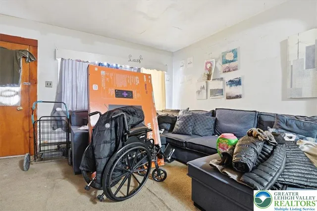 a kitchen with stainless steel appliances granite countertop a stove a sink dishwasher and a refrigerator