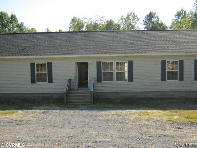 738 Trimers Shop Road West Point, VA 23181 - Photo 1 of 6 a backyard of a house
