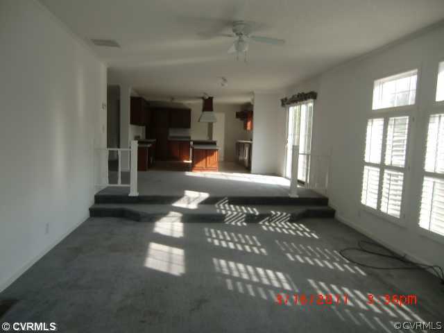 738 Trimers Shop Road West Point, VA 23181 - Photo 3 of 6 a lobby with furniture and window
