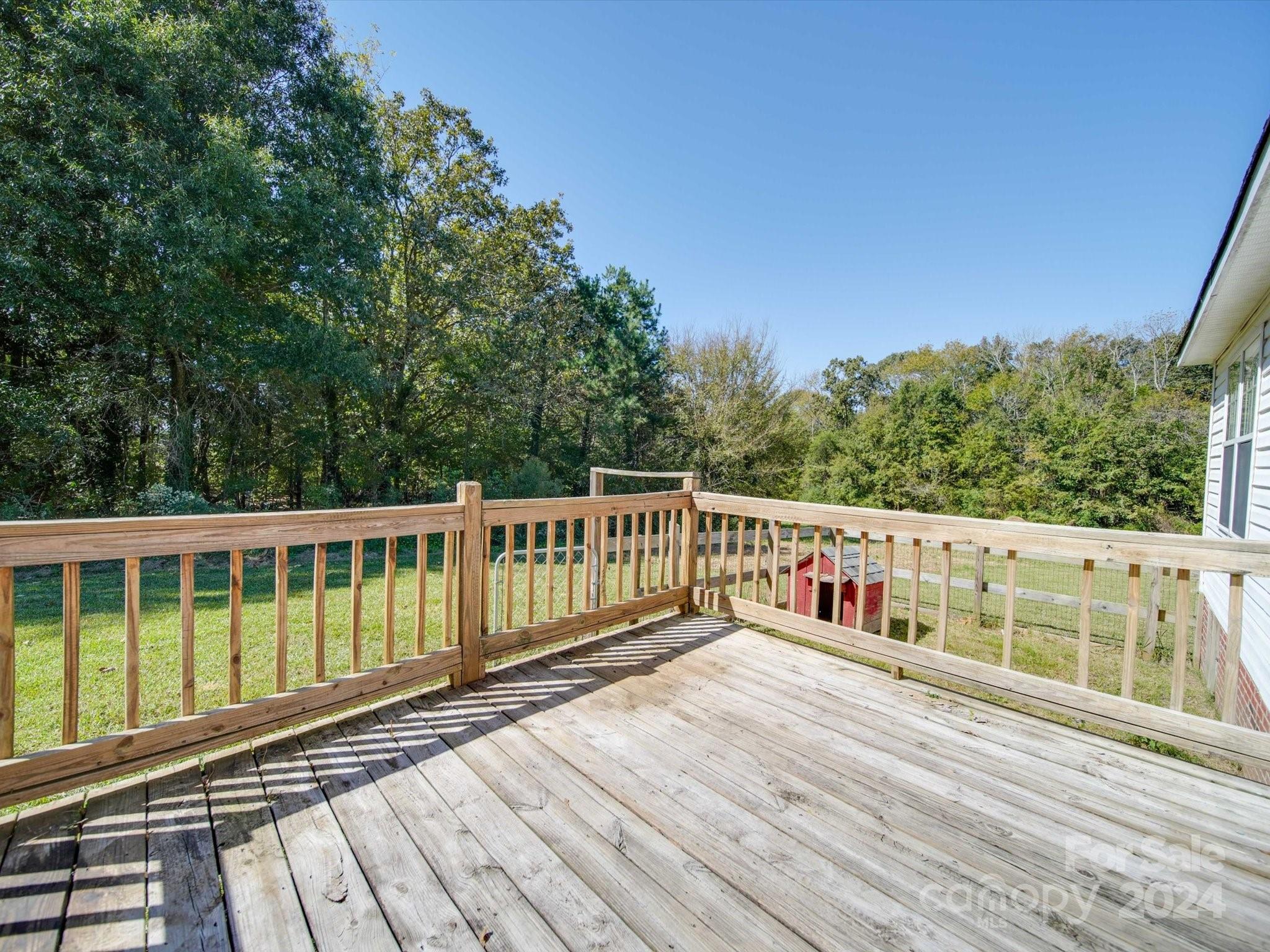 6312 Plyler Mill Road Monroe, NC 28112 - Photo 11 of 41 a view of balcony with wooden floor and fence