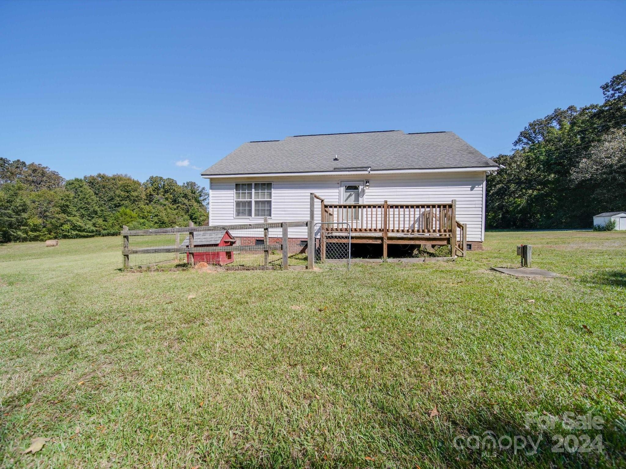 6312 Plyler Mill Road Monroe, NC 28112 - Photo 7 of 41 a front view of a house with a yard