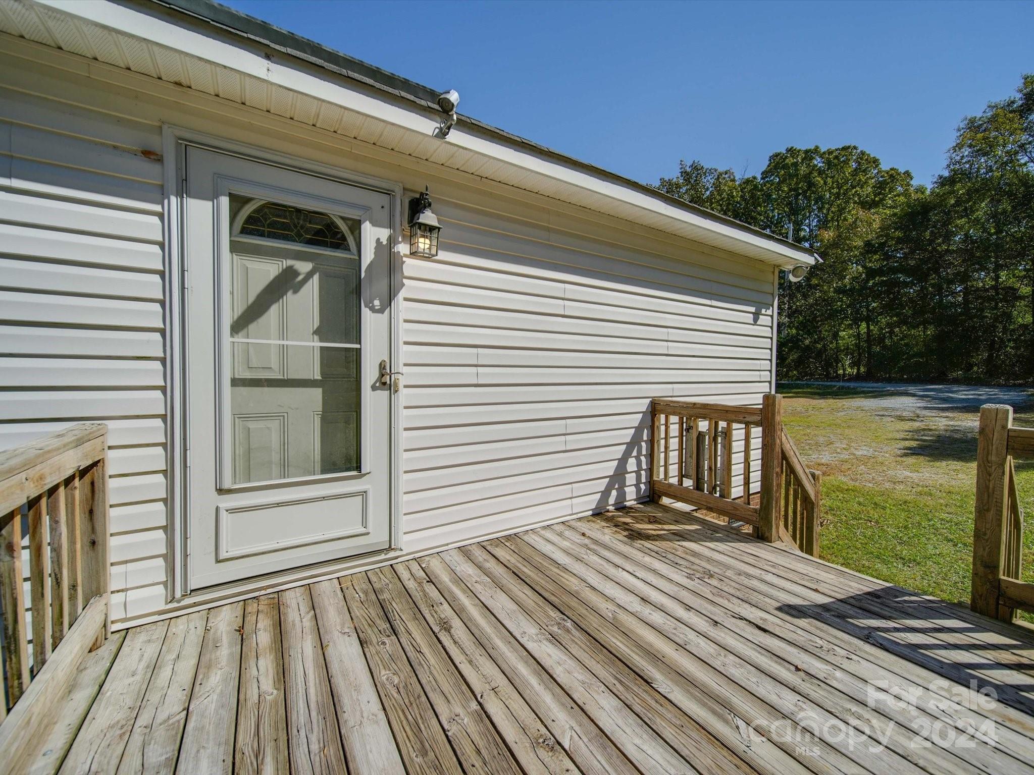 6312 Plyler Mill Road Monroe, NC 28112 - Photo 9 of 41 a view of a wooden deck