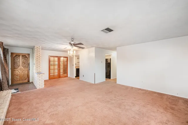 a kitchen with stainless steel appliances granite countertop a stove sink and cabinets