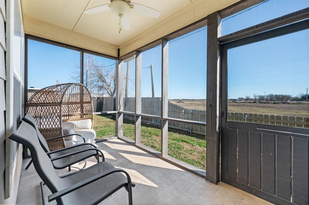 824 East Northside Drive Pilot Point, TX 76258 - Photo 20 of 23 a view of a balcony with furniture