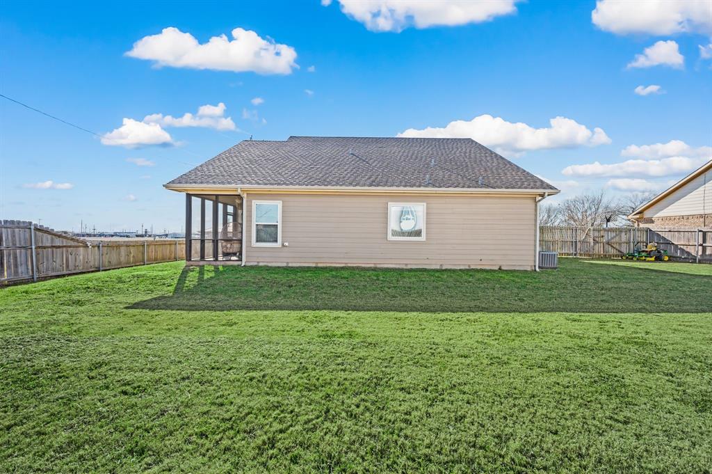 824 East Northside Drive Pilot Point, TX 76258 - Photo 23 of 23 a view of a house with a yard