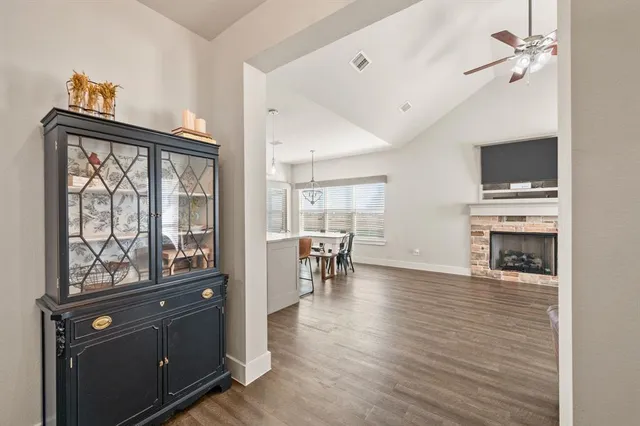 a view of a livingroom with furniture and a flat screen tv