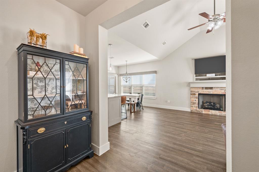 824 East Northside Drive Pilot Point, TX 76258 - Photo 3 of 23 a view of a livingroom with furniture and a flat screen tv