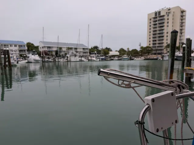 a view of a lake with tall buildings