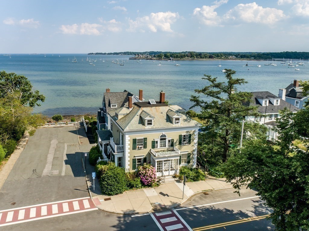 79 Lothrop Street Beverly, MA 01915 - Photo 3 of 12 a view of a lake with a building in the background
