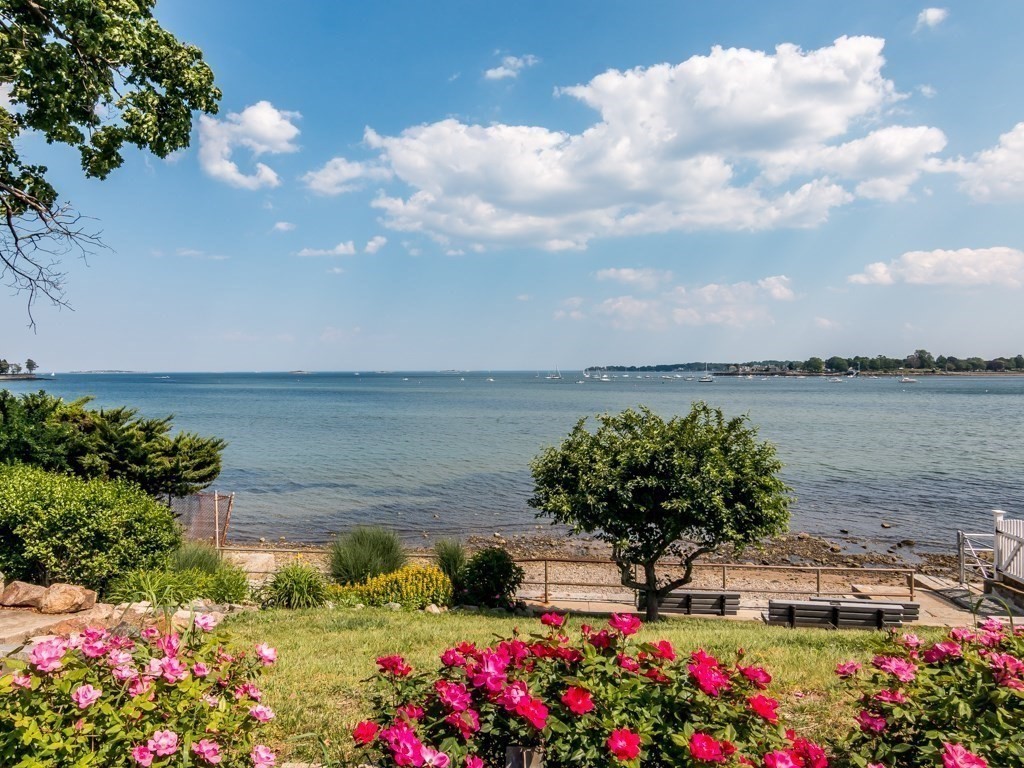 79 Lothrop Street Beverly, MA 01915 - Photo 9 of 12 a view of a lake with a yard