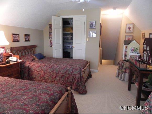 55 Cottage Ridge Road Fletcher, NC 28732 - Photo 11 of 20 a bedroom with a bed and a view of living room
