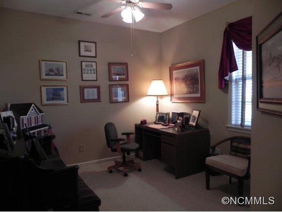 55 Cottage Ridge Road Fletcher, NC 28732 - Photo 13 of 20 a view of a workspace with furniture and a window