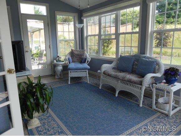 55 Cottage Ridge Road Fletcher, NC 28732 - Photo 14 of 20 a living room with furniture and a floor to ceiling window