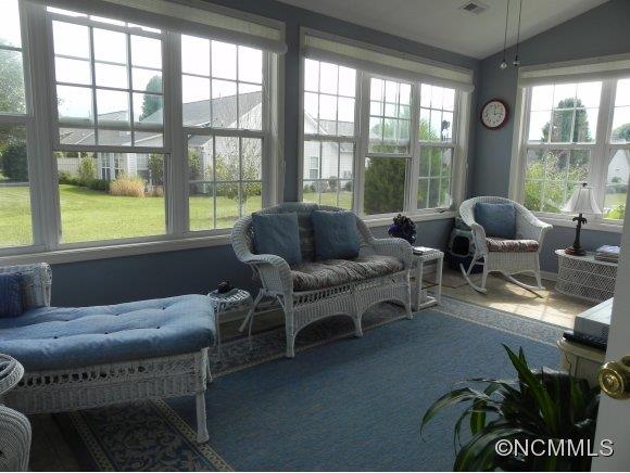 55 Cottage Ridge Road Fletcher, NC 28732 - Photo 15 of 20 a living room with furniture and a floor to ceiling window