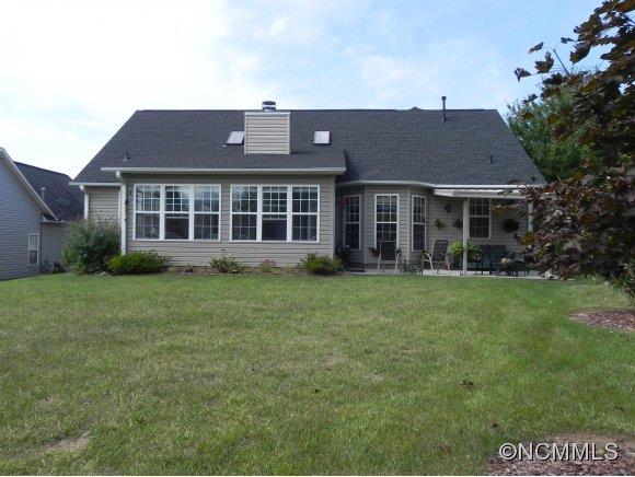 55 Cottage Ridge Road Fletcher, NC 28732 - Photo 17 of 20 a view of a house with a garden