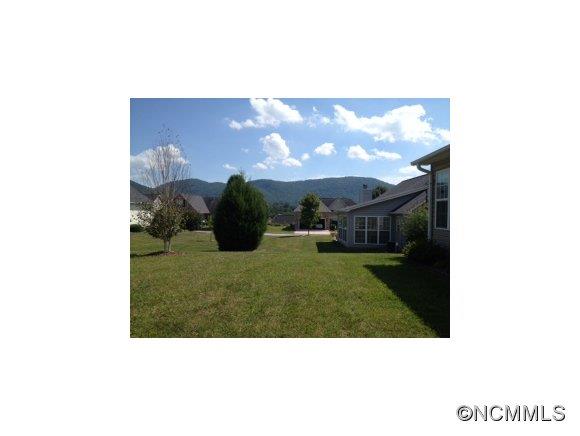 55 Cottage Ridge Road Fletcher, NC 28732 - Photo 20 of 20 a picture of a person on a big yard