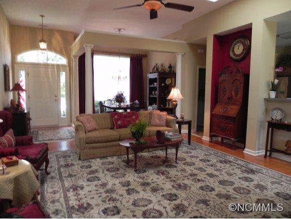 55 Cottage Ridge Road Fletcher, NC 28732 - Photo 4 of 20 a living room with furniture and a chandelier