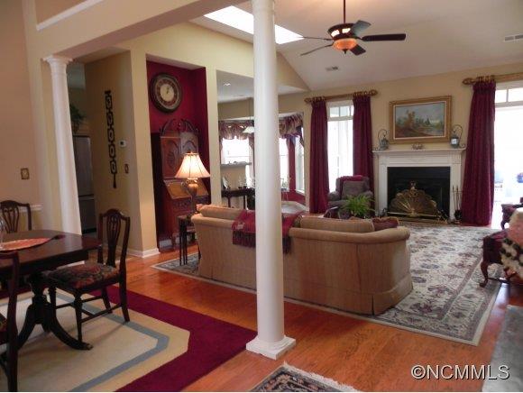 55 Cottage Ridge Road Fletcher, NC 28732 - Photo 5 of 20 a living room with furniture a fireplace and a flat screen tv