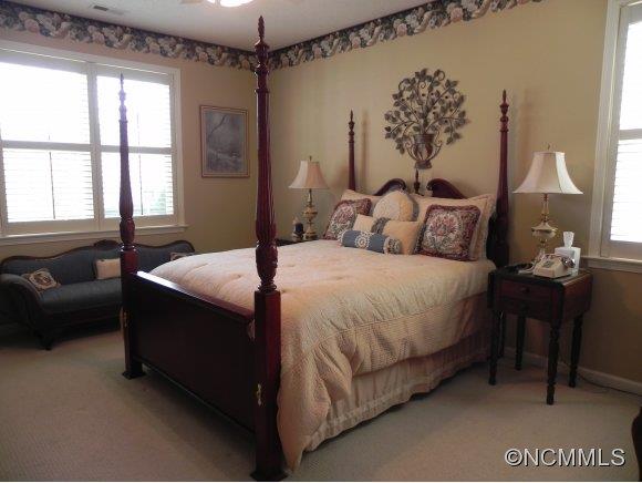55 Cottage Ridge Road Fletcher, NC 28732 - Photo 7 of 20 a bedroom with a bed and a couch