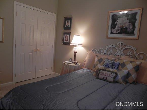 55 Cottage Ridge Road Fletcher, NC 28732 - Photo 10 of 20 a bedroom with bed and a painting on the wall