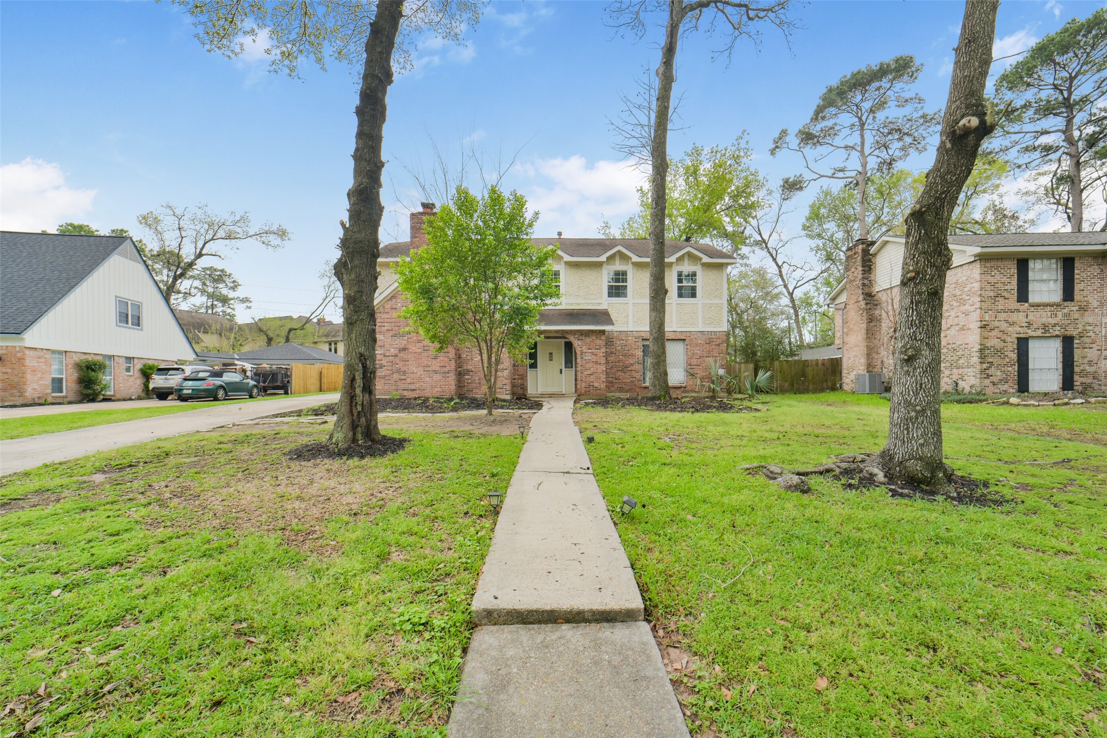 7611 Theisswood Road Spring, TX 77379 - Photo 36 of 41 a view of a yard with palm trees