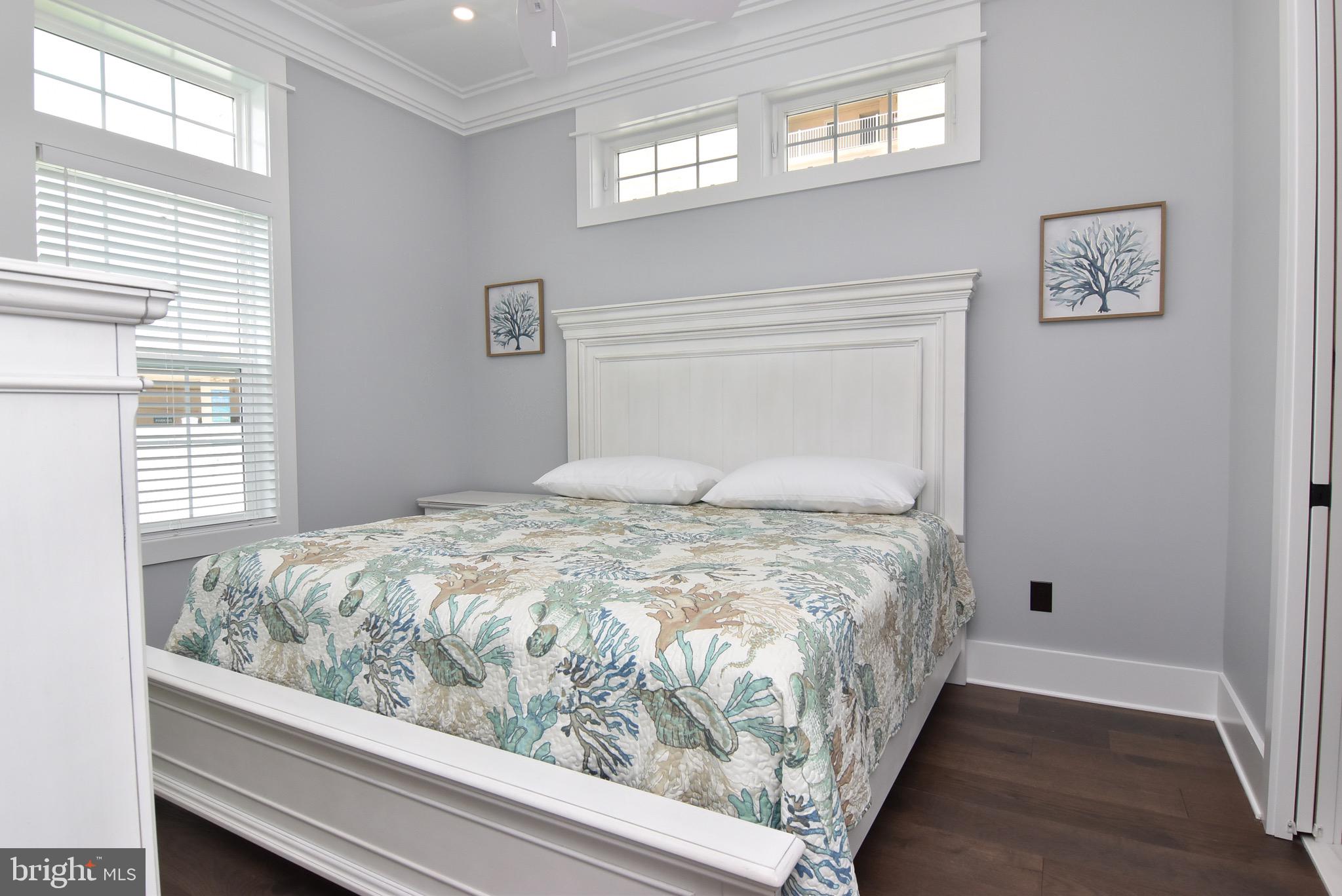 3 Laurel Street Rehoboth Beach, DE 19971 - Photo 14 of 47 a bedroom with a bed and window