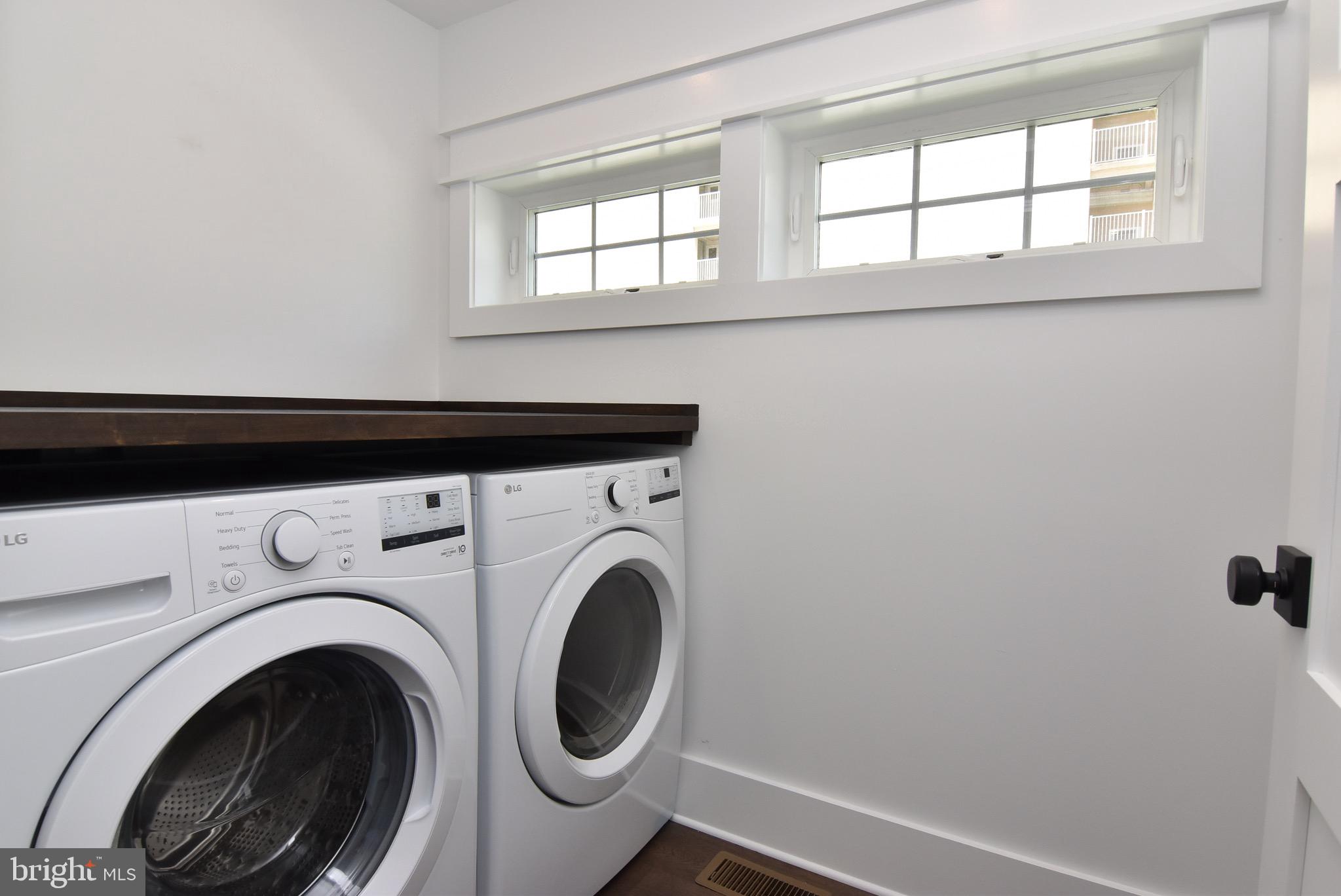 3 Laurel Street Rehoboth Beach, DE 19971 - Photo 21 of 47 a close up view of washer and dryer
