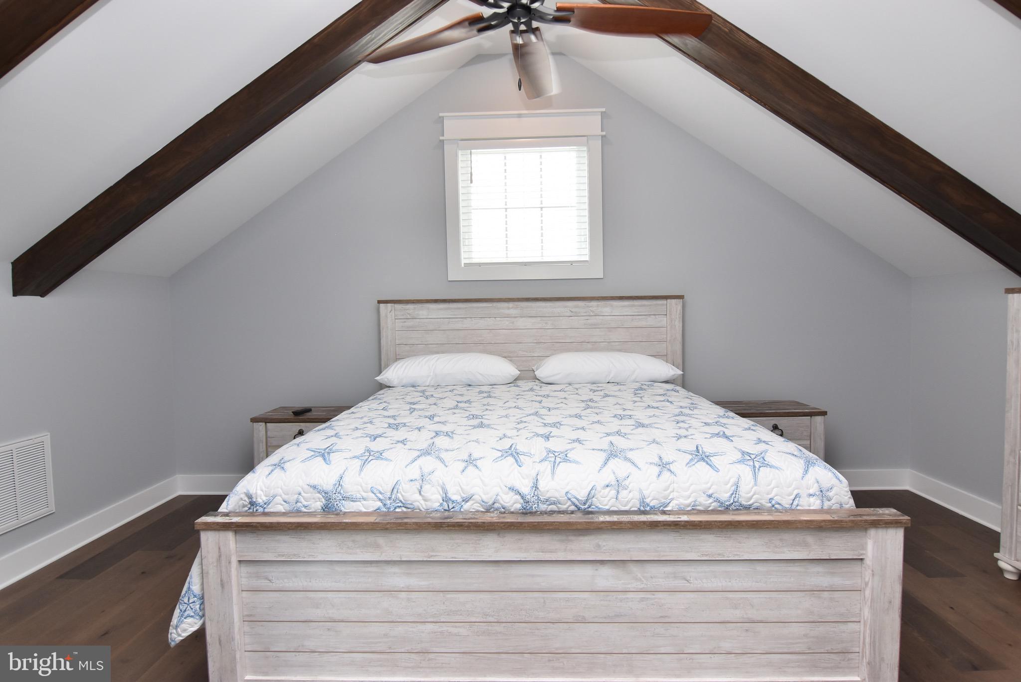 3 Laurel Street Rehoboth Beach, DE 19971 - Photo 36 of 47 a bedroom with a bed and window